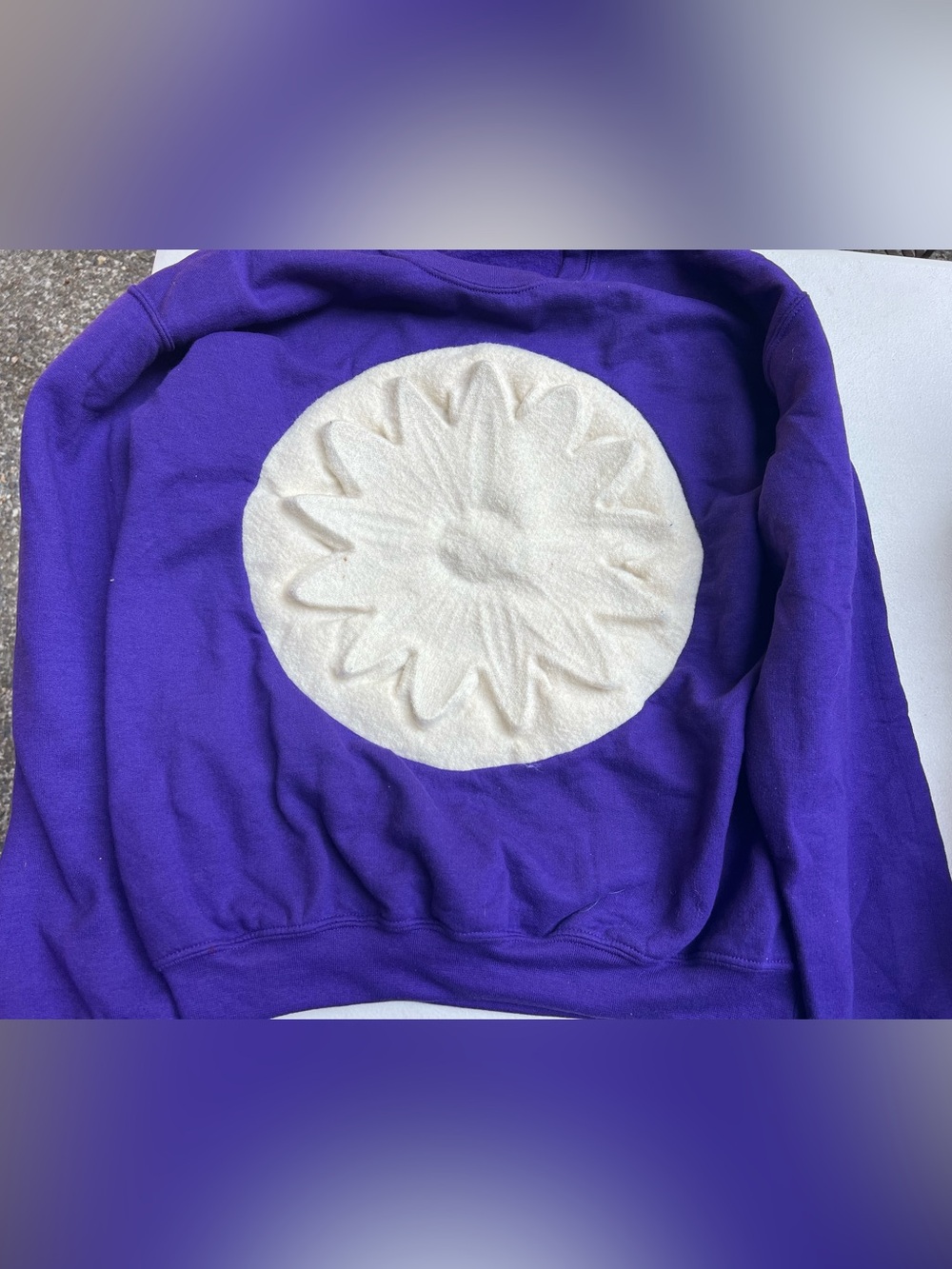 Women’s Purple Crewneck Sweater with Cream Sunburst Appliqué